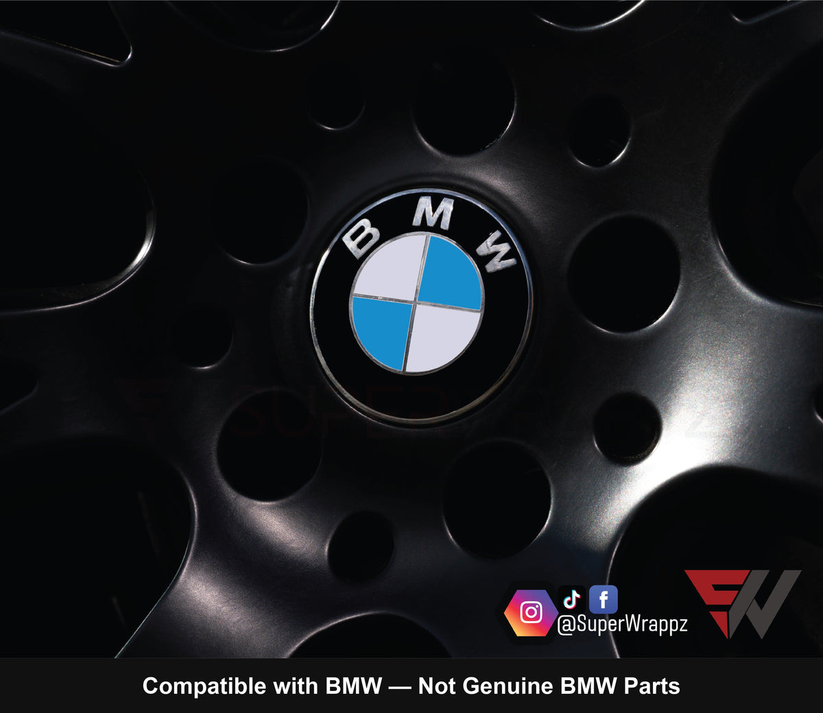 White & Baby Blue Gloss BMW badge overlay on an alloy wheel centre cap, close-up