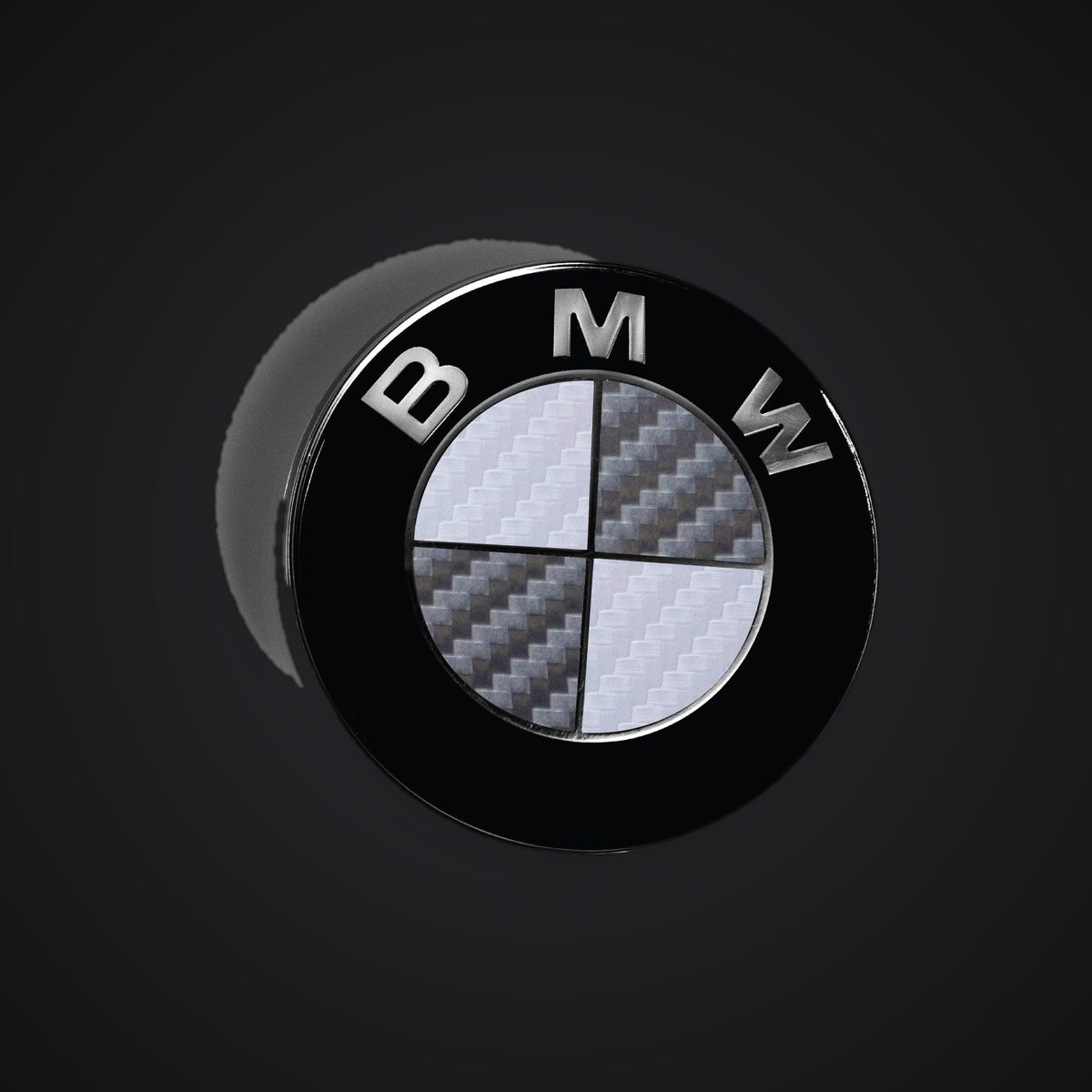 White Dark Grey Carbon BMW badge overlay — SuperWrappz hero. Compatible with BMW — Not Genuine BMW Parts.