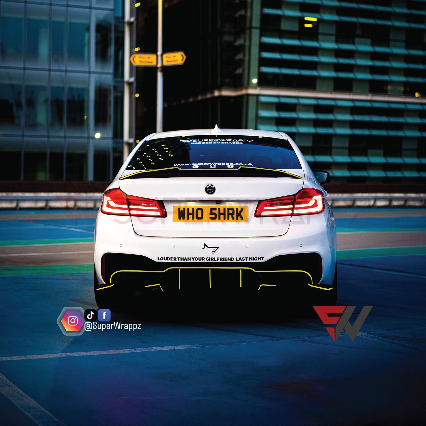 Customer's BMW with the Yellow 1cm reflective pin stripe kit, rear view