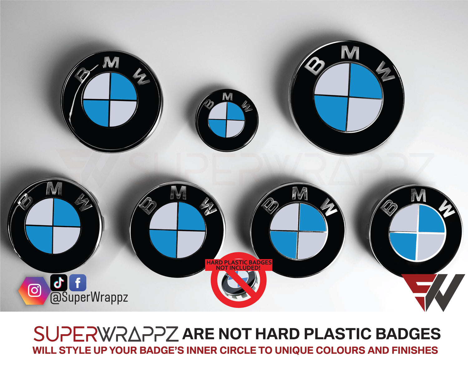 White and Baby Blue Gloss BMW badge overlay by SuperWrappz on E/F Series emblems, aftermarket cast-vinyl set