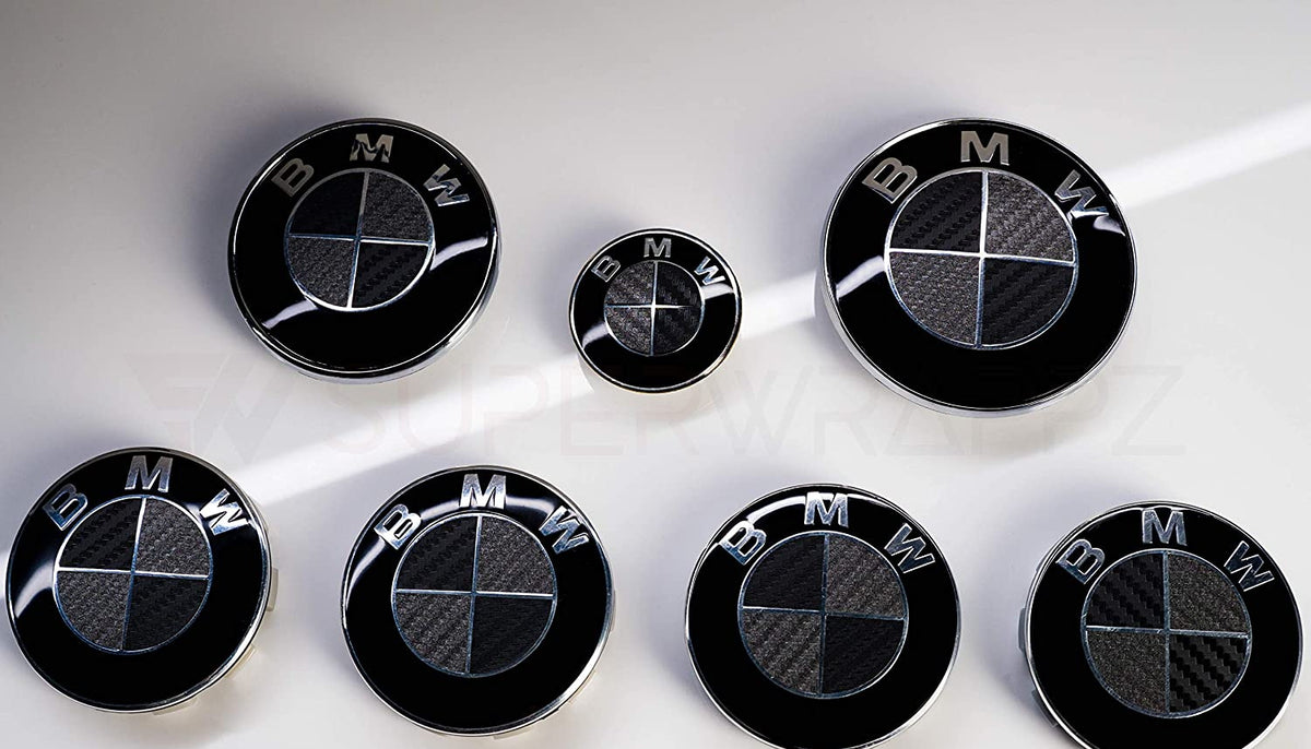 Black & Dark Grey Carbon BMW badge overlay, complete badge set laid out on a plain background
