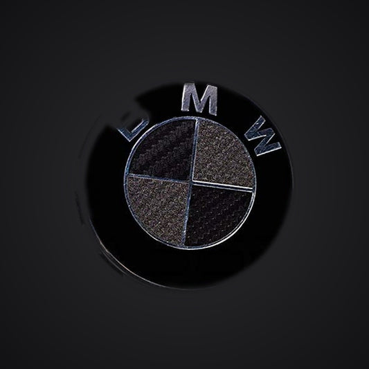 Black Dark Grey Carbon BMW badge overlay — SuperWrappz hero. Compatible with BMW — Not Genuine BMW Parts.