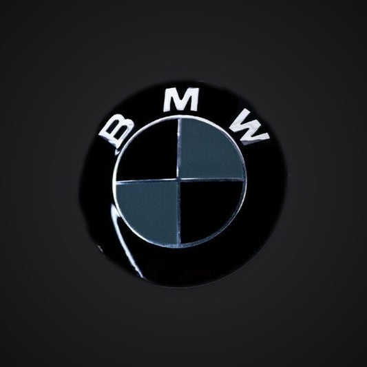 Black Dark Grey Gloss BMW badge overlay — SuperWrappz hero. Compatible with BMW — Not Genuine BMW Parts.