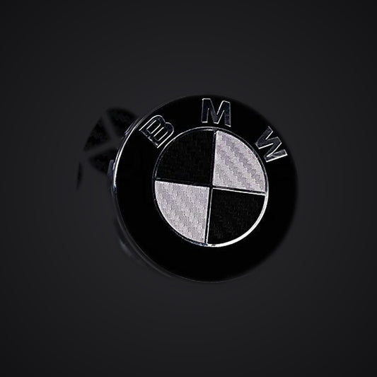 Black silver carbon BMW badge overlay — SuperWrappz hero. Compatible with BMW — Not Genuine BMW Parts.