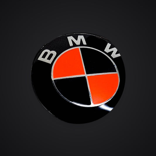 Fluorescent Red Black Gloss BMW badge overlay — SuperWrappz hero. Compatible with BMW — Not Genuine BMW Parts.