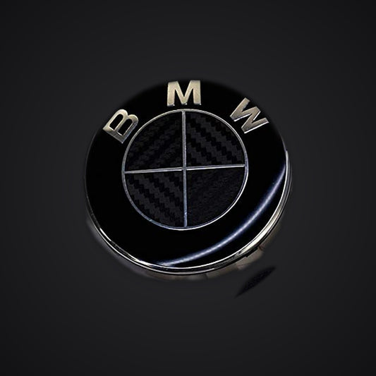 Full Black Carbon BMW badge overlay — SuperWrappz hero. Compatible with BMW — Not Genuine BMW Parts.