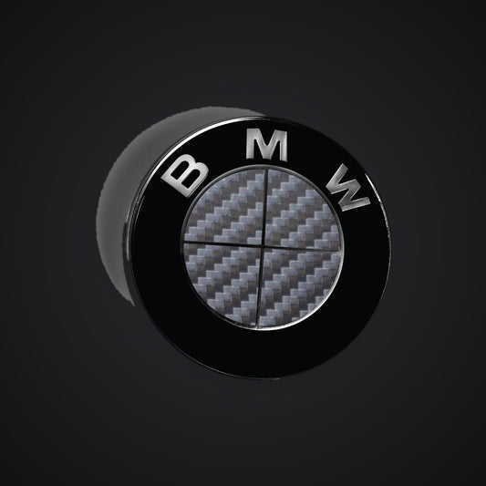Full Dark Grey Carbon BMW badge overlay — SuperWrappz hero. Compatible with BMW — Not Genuine BMW Parts.
