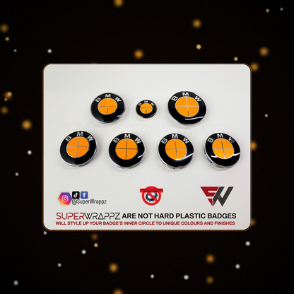 Full orange fluorescent BMW badge overlay — SuperWrappz hero