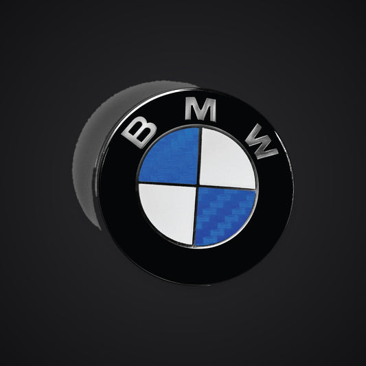Half Blue Carbon BMW badge overlay — SuperWrappz hero. Compatible with BMW — Not Genuine BMW Parts.