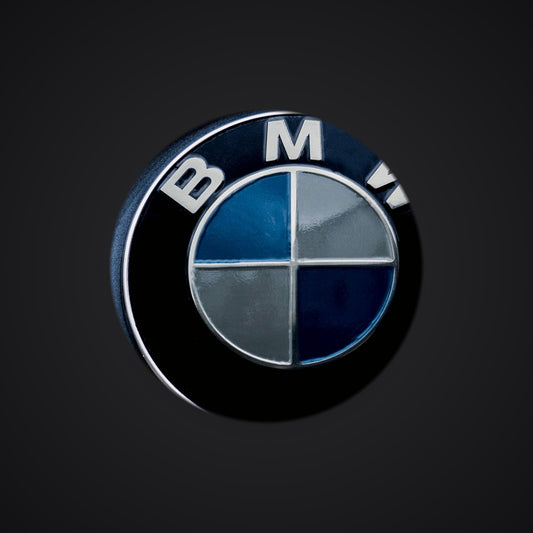 Light Smoke BMW badge tint, 2-piece, fitted — SuperWrappz hero. Compatible with BMW — Not Genuine BMW Parts.