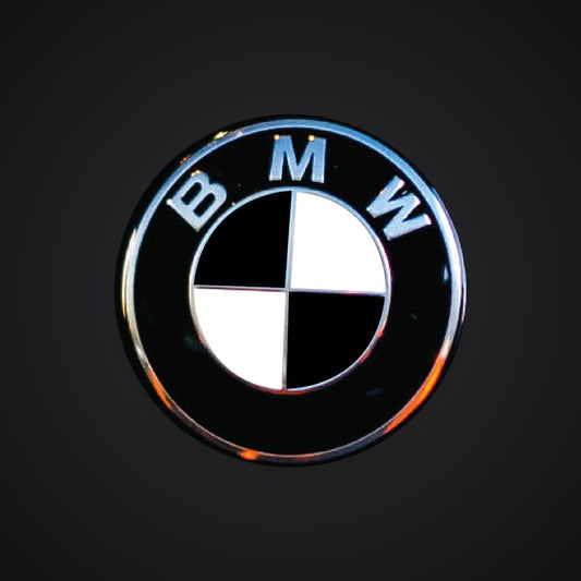 V2 Black White Gloss BMW badge overlay — SuperWrappz hero. Compatible with BMW — Not Genuine BMW Parts.