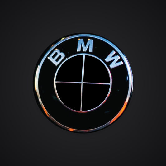 V2 Full Black Gloss BMW badge overlay — SuperWrappz hero. Compatible with BMW — Not Genuine BMW Parts.