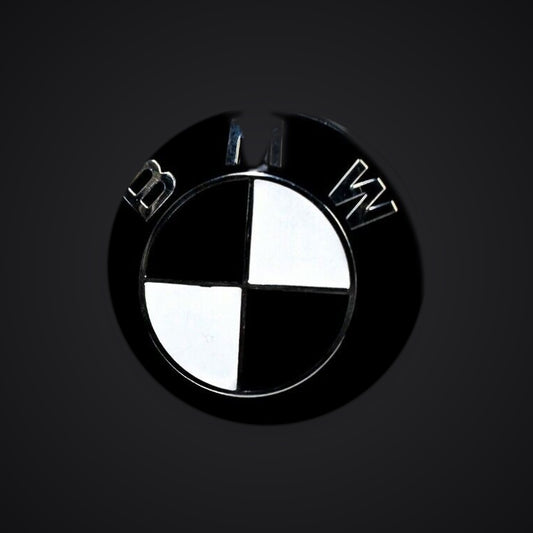 V2 Half Black Gloss BMW badge overlay — SuperWrappz hero. Compatible with BMW — Not Genuine BMW Parts.