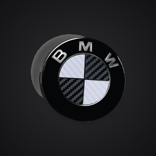 White Black Carbon BMW badge overlay — SuperWrappz hero. Compatible with BMW — Not Genuine BMW Parts.