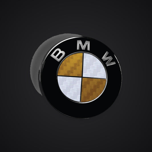 White gold carbon BMW badge overlay — SuperWrappz hero. Compatible with BMW — Not Genuine BMW Parts.