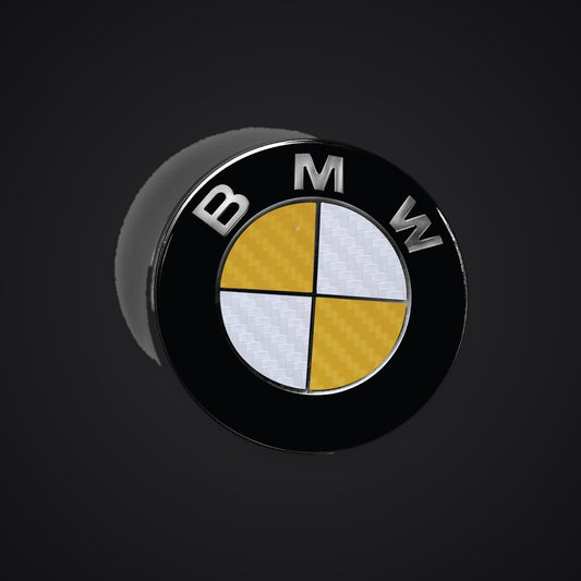 White Yellow Carbon BMW badge overlay — SuperWrappz hero. Compatible with BMW — Not Genuine BMW Parts.