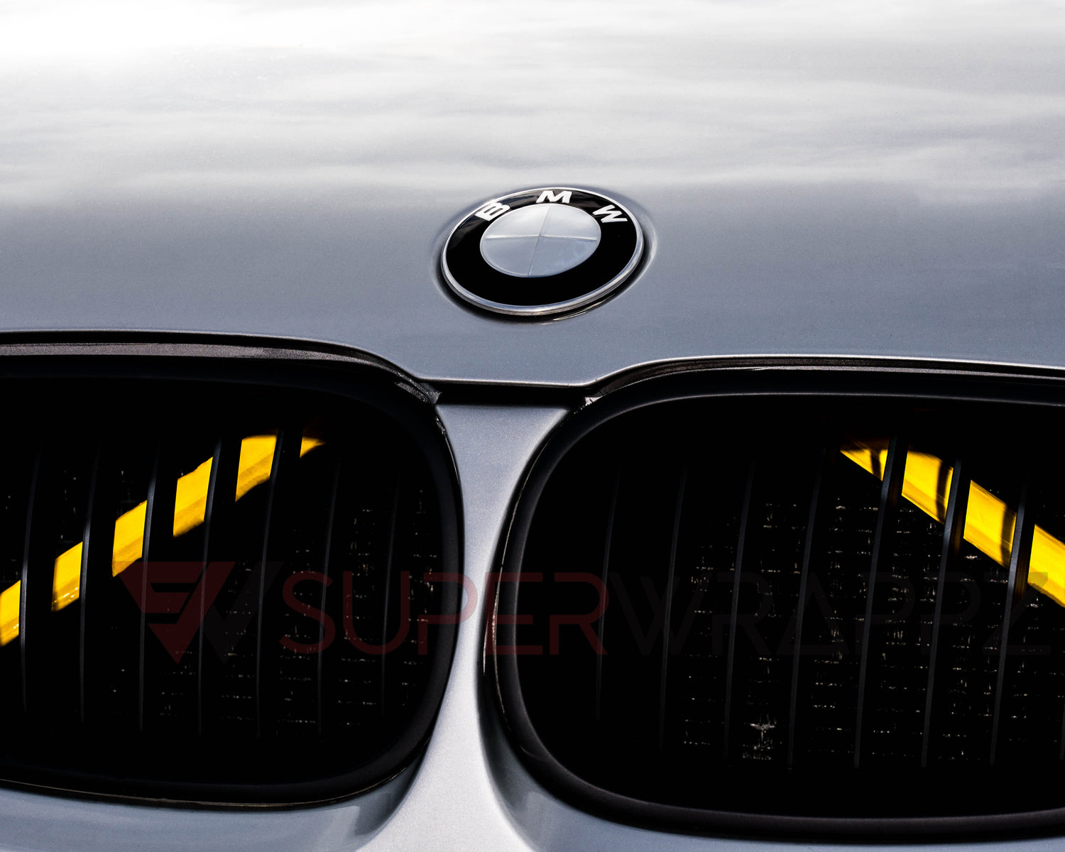 Yellow reflective V-brace and crash-bar vinyl overlay for BMW by SuperWrappz, aftermarket