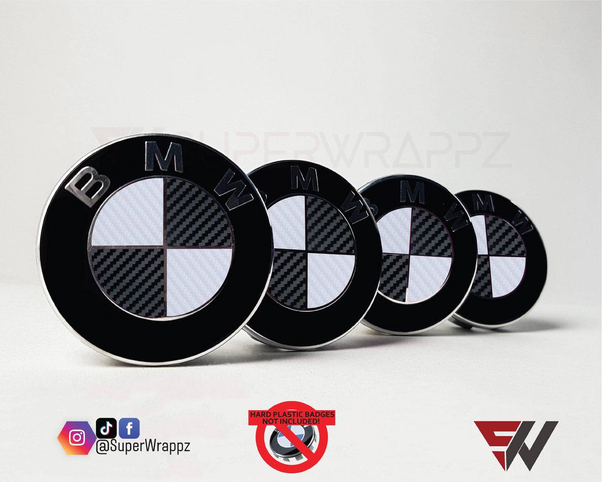 White & Black Carbon BMW badge overlay, complete badge set laid out on a plain background