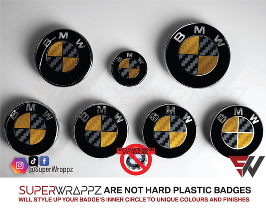 Black and Gold Carbon BMW badge overlay by SuperWrappz on E/F Series emblems, aftermarket cast-vinyl set