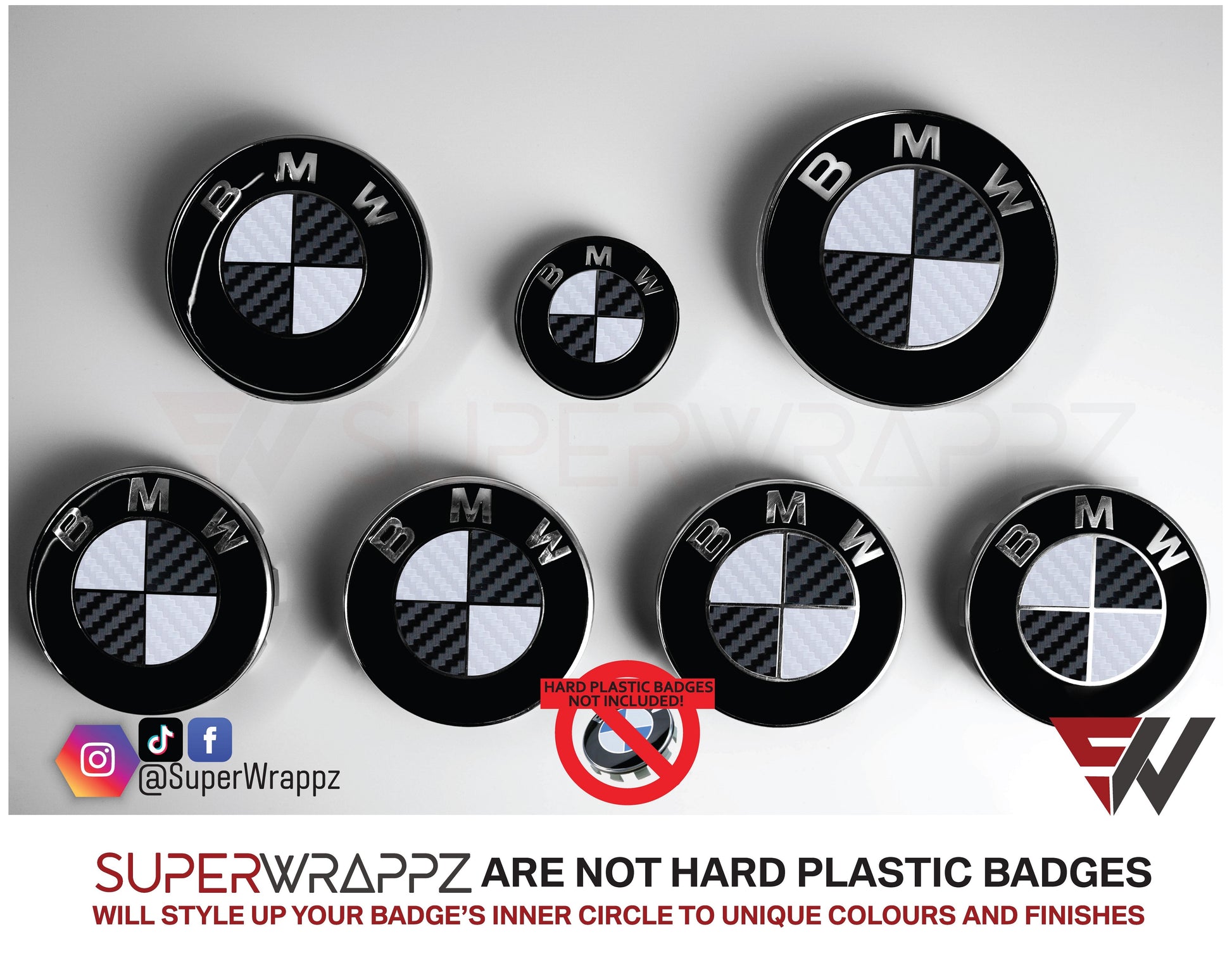 White and Black Carbon BMW badge overlay by SuperWrappz on E/F Series emblems, aftermarket cast-vinyl set