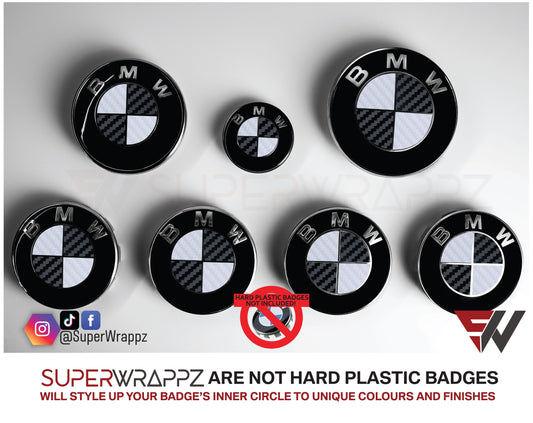 White and Black Carbon BMW badge overlay by SuperWrappz on E/F Series emblems, aftermarket cast-vinyl set