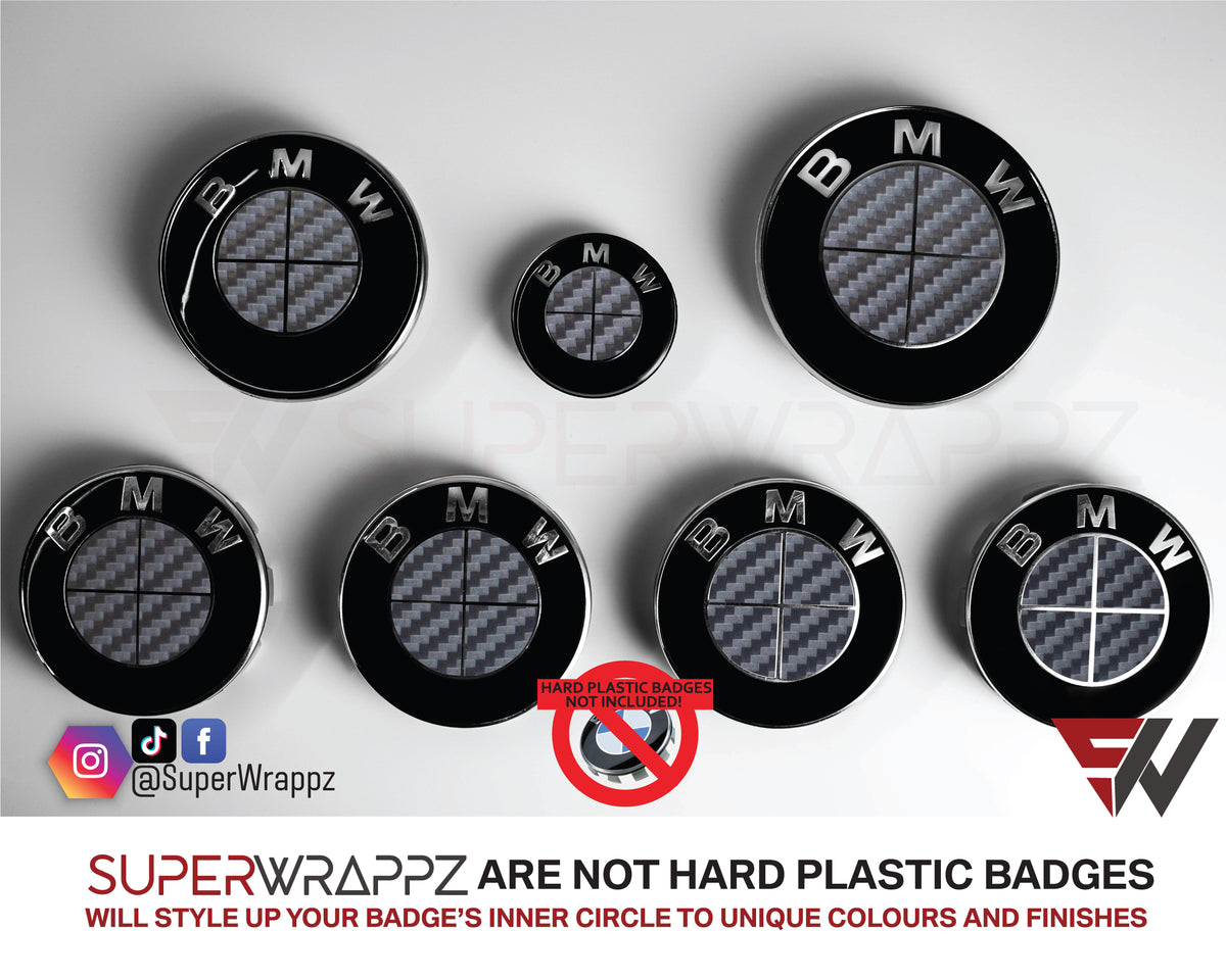 Full Dark Grey Carbon BMW badge overlay by SuperWrappz on E/F Series emblems, aftermarket cast-vinyl set