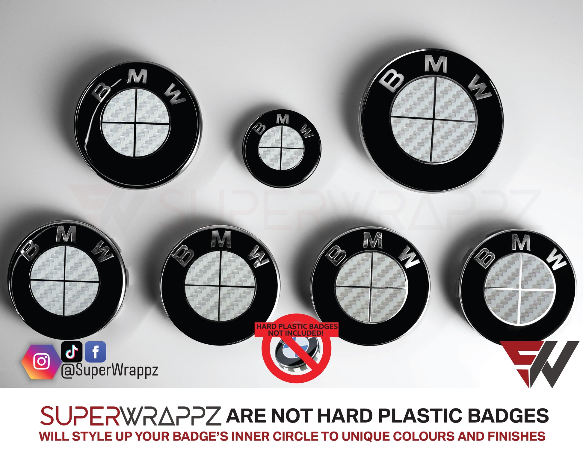 Full Silver Carbon BMW badge overlay by SuperWrappz on E/F Series emblems, aftermarket cast-vinyl set