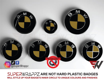 Black and Gold Gloss BMW badge overlay by SuperWrappz on E/F Series emblems, aftermarket cast-vinyl set