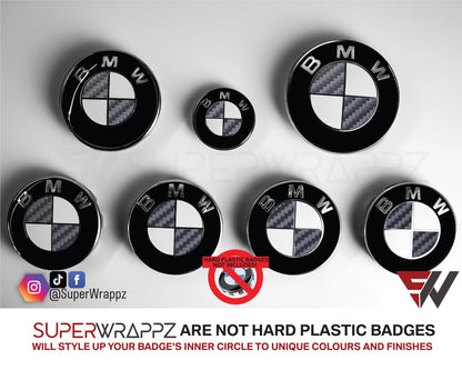 Half Dark Grey Carbon BMW badge overlay by SuperWrappz on E/F Series emblems, aftermarket cast-vinyl set