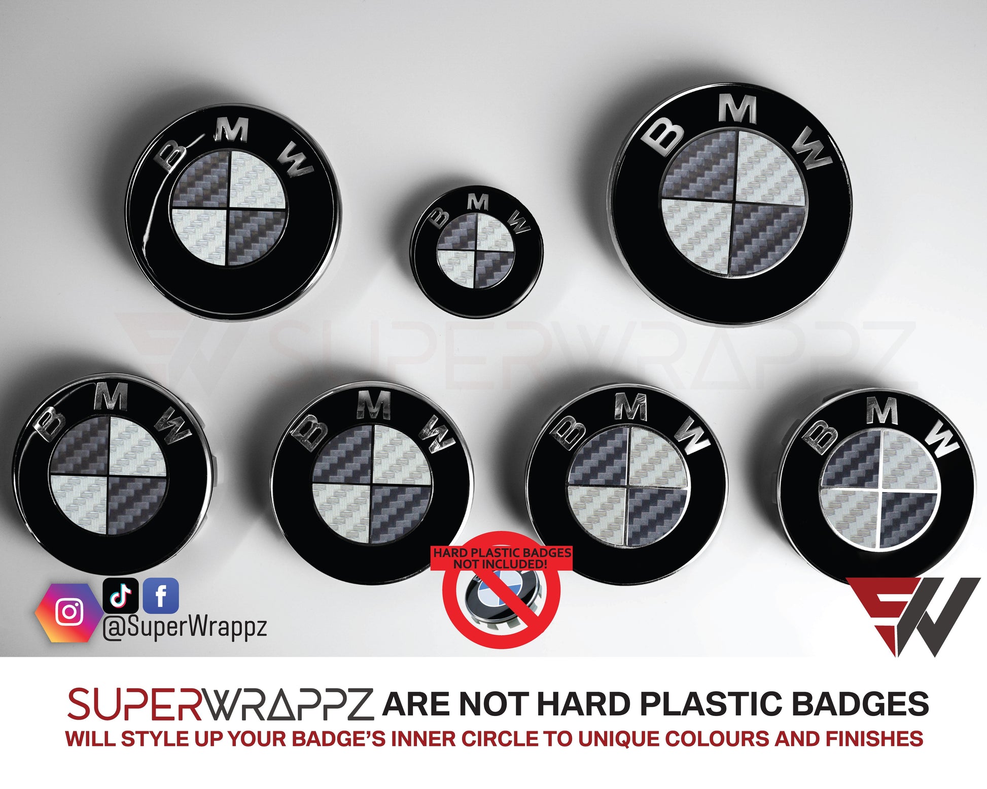 Dark Grey and Silver Carbon BMW badge overlay by SuperWrappz on E/F Series emblems, aftermarket cast-vinyl set