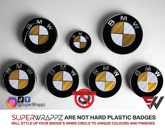 White and Gold Carbon BMW badge overlay by SuperWrappz on E/F Series emblems, aftermarket cast-vinyl set