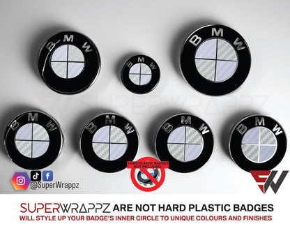 White and Silver Carbon BMW badge overlay by SuperWrappz on E/F Series emblems, aftermarket cast-vinyl set