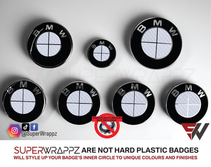 Full White Carbon BMW badge overlay by SuperWrappz on E/F Series emblems, aftermarket cast-vinyl set