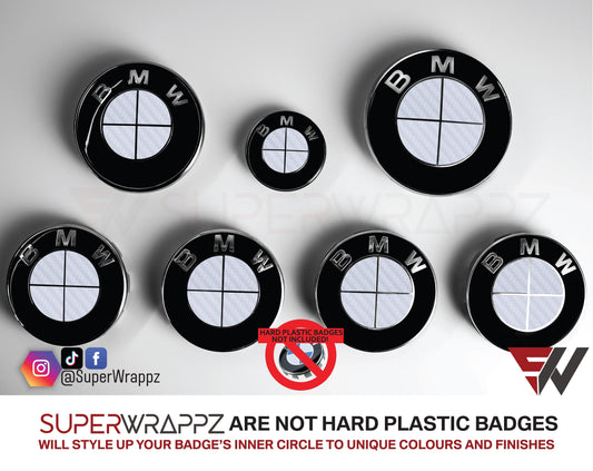 Full White Carbon BMW badge overlay by SuperWrappz on E/F Series emblems, aftermarket cast-vinyl set