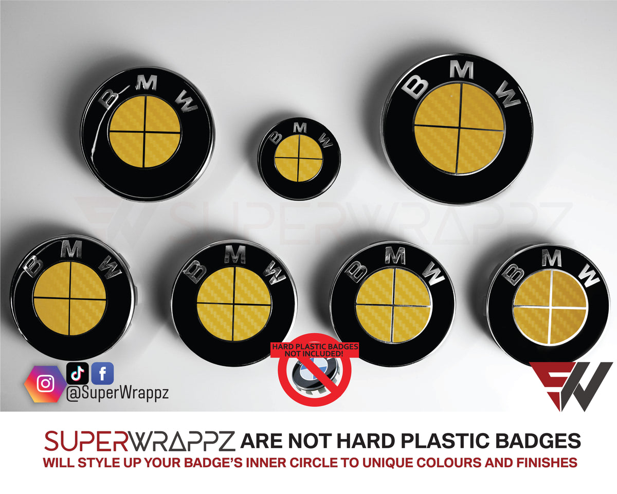 Full Yellow Carbon BMW badge overlay by SuperWrappz on E/F Series emblems, aftermarket cast-vinyl set