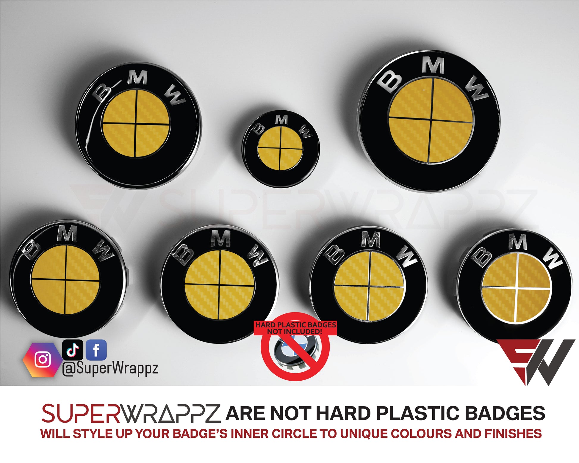 Full Yellow Carbon BMW badge overlay by SuperWrappz on E/F Series emblems, aftermarket cast-vinyl set