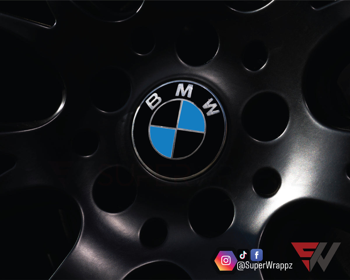 Black & Blue Gloss BMW badge overlay, alloy wheel with centre cap fitted, mounted on the car