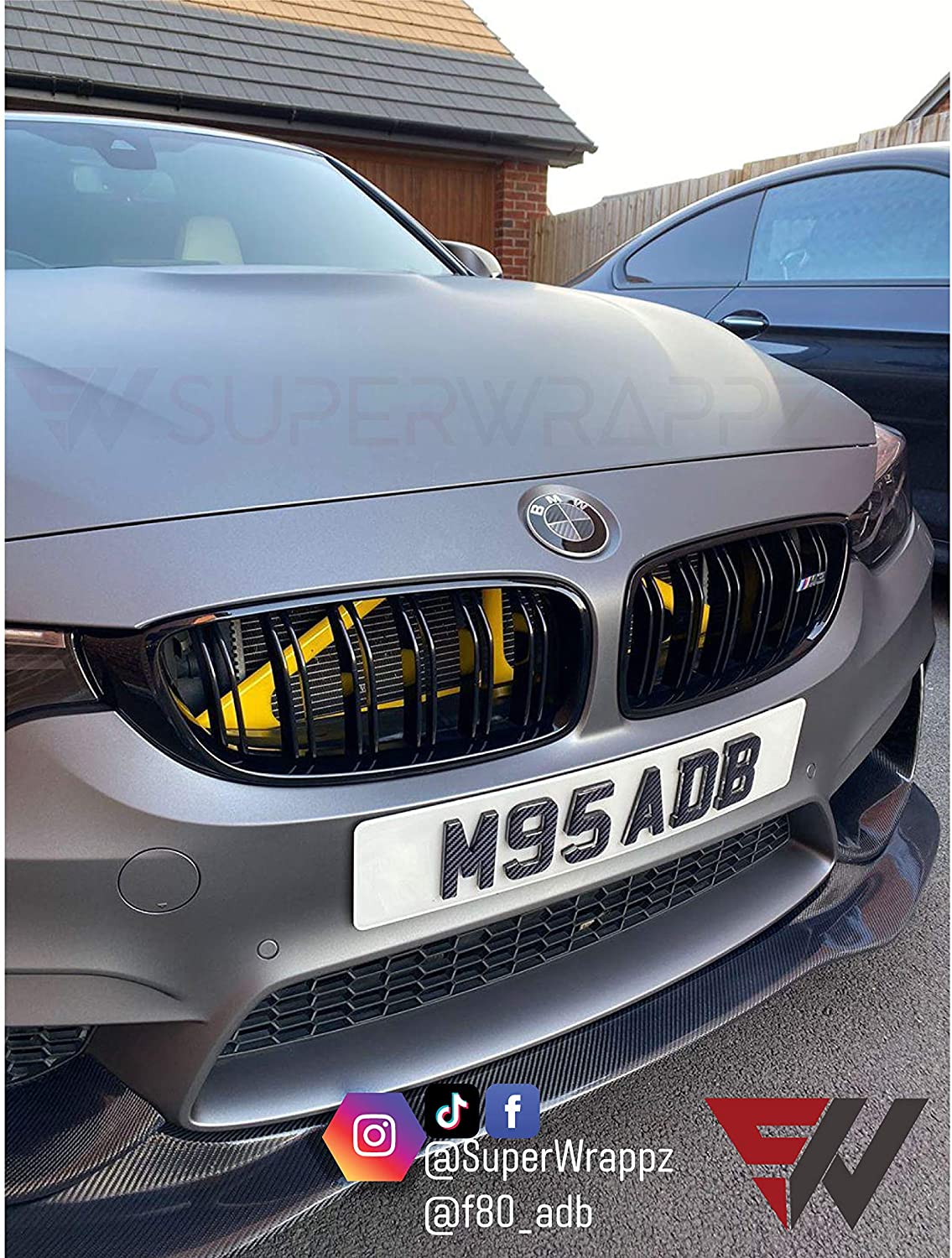 Black & Dark Grey Carbon V1 BMW Badge Overlay — Compatible with E/F Series | SuperWrappz