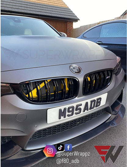Black & Dark Grey Carbon V1 BMW Badge Overlay — Compatible with E/F Series | SuperWrappz