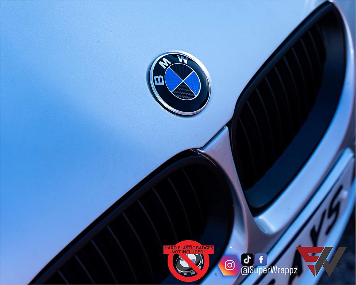 Black & Blue Carbon BMW badge overlay applied to the front hood badge, close-up