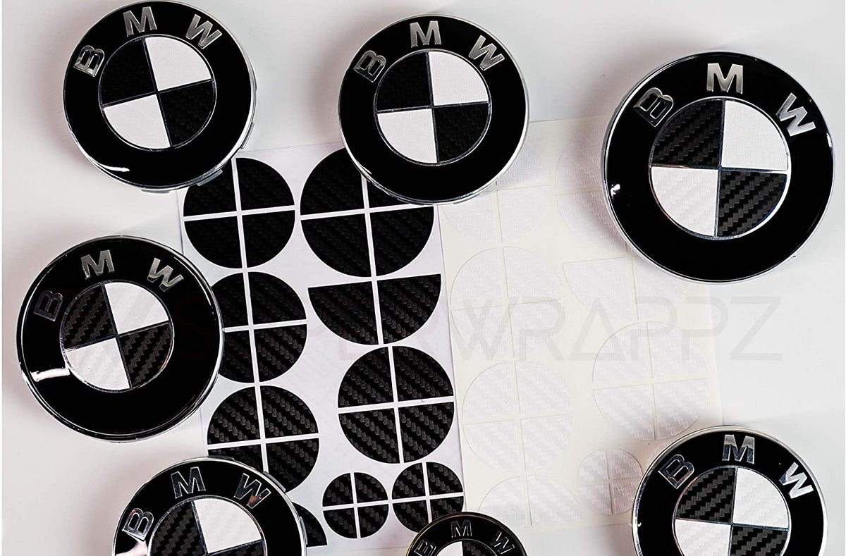 Black and White Carbon BMW badge overlay by SuperWrappz on E/F Series emblems, aftermarket cast-vinyl set