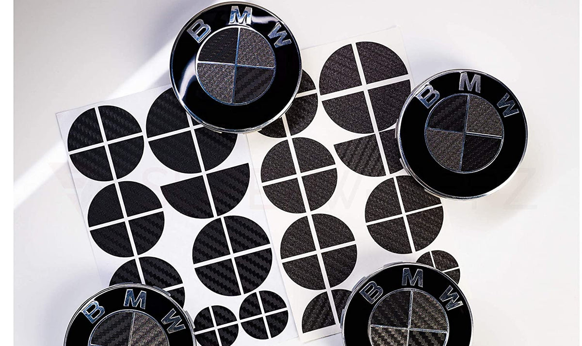 Black and Dark Grey Carbon BMW badge overlay by SuperWrappz on E/F Series emblems, aftermarket cast-vinyl set