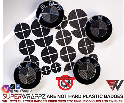 Black and Dark Grey Carbon BMW badge overlay by SuperWrappz on E/F Series emblems, aftermarket cast-vinyl set
