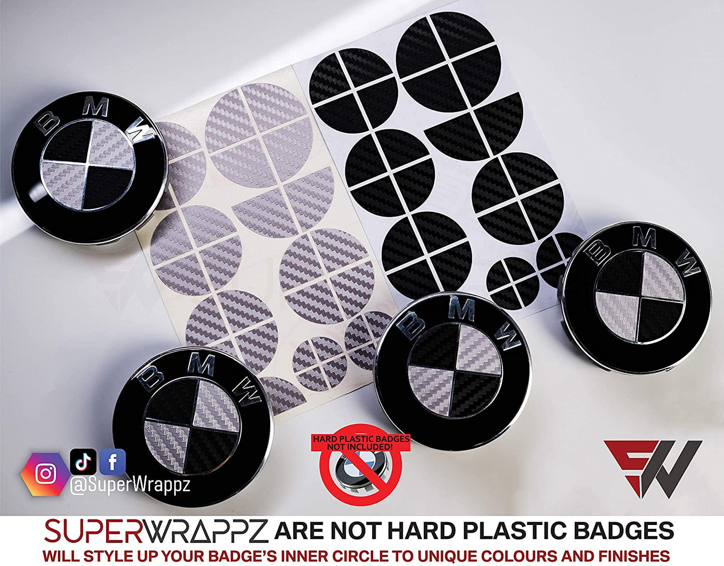 Black and Silver Carbon BMW badge overlay by SuperWrappz on E/F Series emblems, aftermarket cast-vinyl set