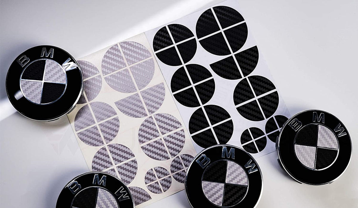Black and Silver Carbon BMW badge overlay by SuperWrappz on E/F Series emblems, aftermarket cast-vinyl set