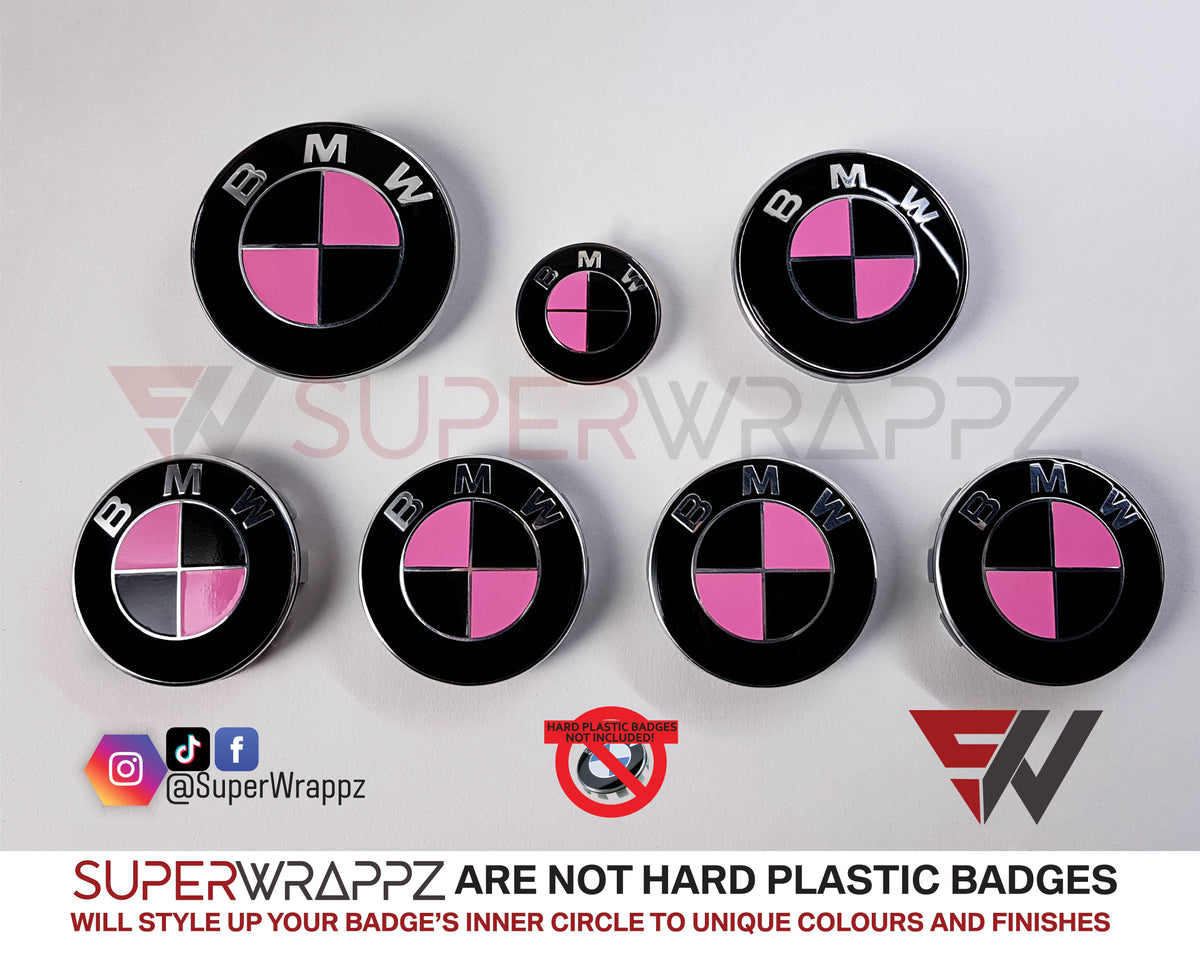 Pink and Black Gloss BMW badge overlay by SuperWrappz on E/F Series emblems, aftermarket cast-vinyl set