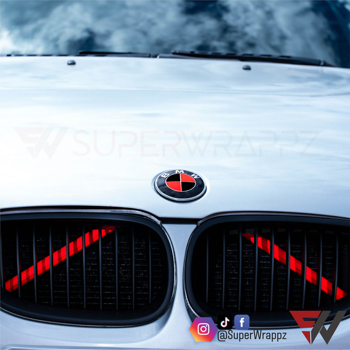 Customer photo of a BMW with the fluorescent red & black gloss finish installed