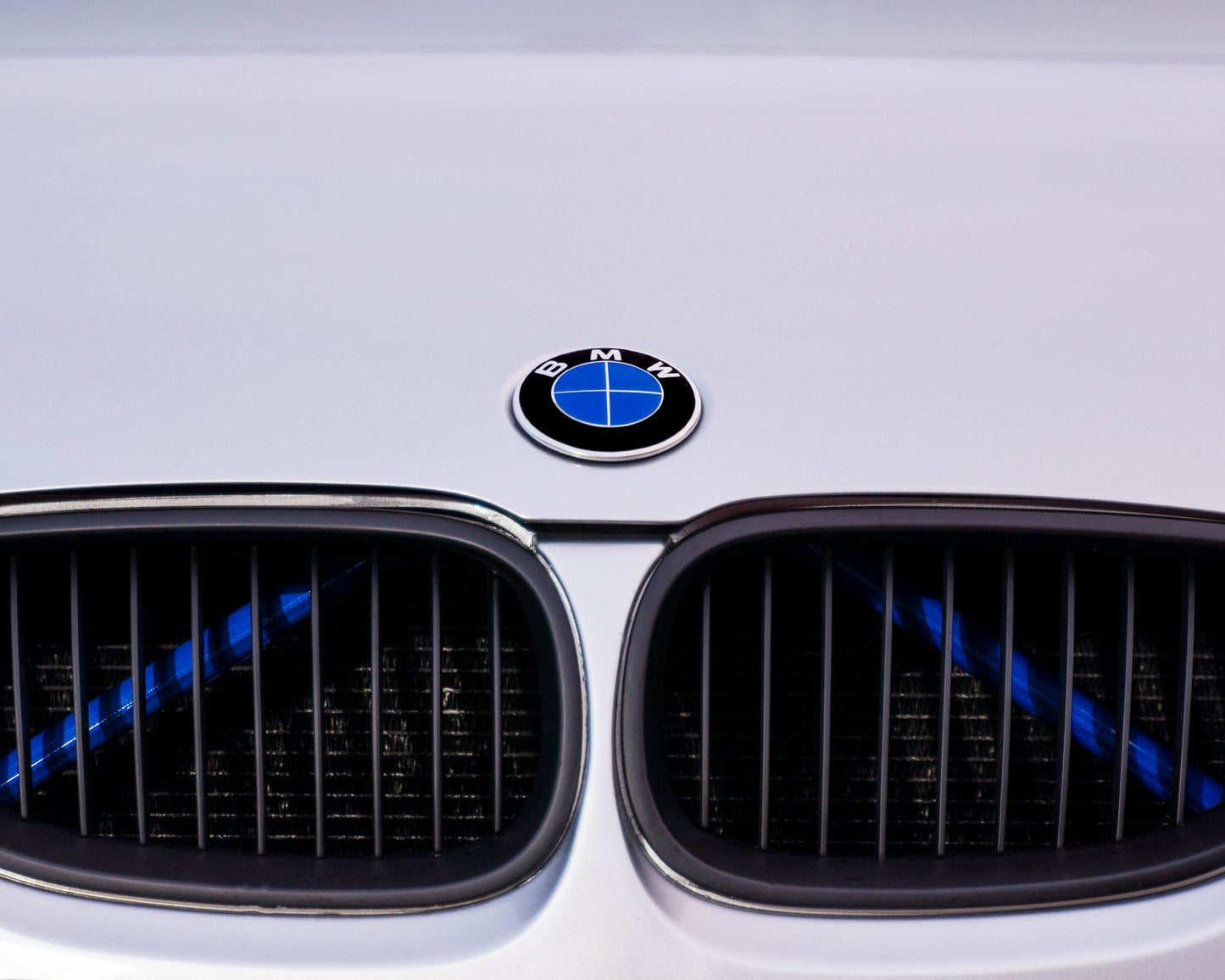 Blue reflective V-brace and crash-bar vinyl overlay for BMW by SuperWrappz, aftermarket