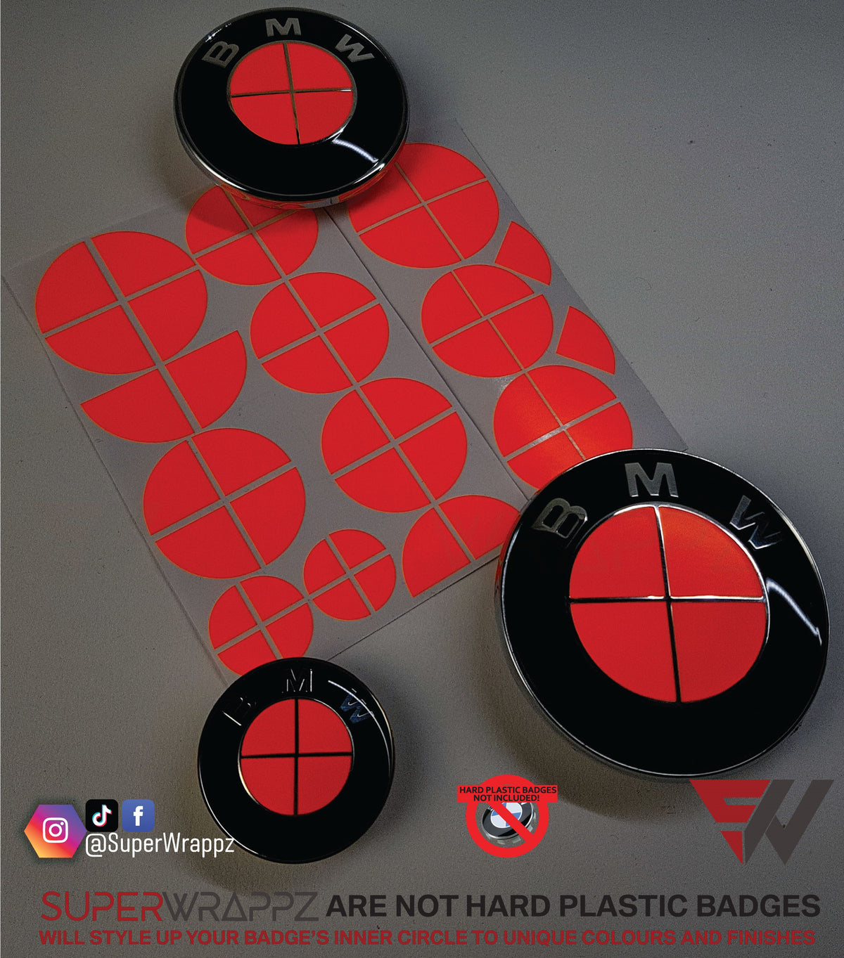 Full Red Fluorescent BMW badge overlay, shown uncut on its adhesive backing sheet before application