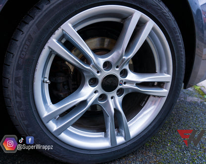 Black Gloss BMW Badge Tint Overlay — 9-Piece | V1 Compatible | E/F Series | SuperWrappz